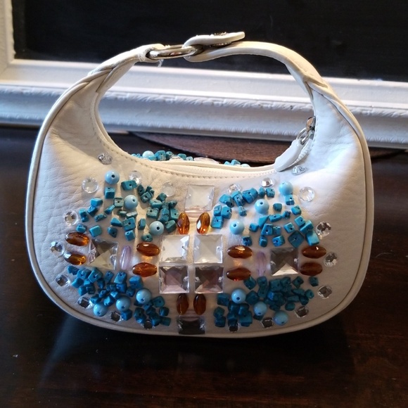 Cole Haan Handbags - Cole Haan Mini Hobo. White leather with beading.